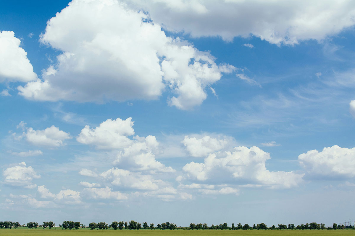 Beautiful clouds over a lush landscape
